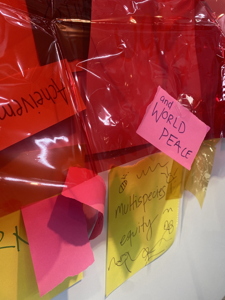 image of layers of arts and crafts materials, depicting a moodboard of sensory feelings about the mood of the city